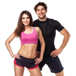 Fit young couple in workout gear