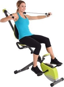 YOung woman using the Stamina Wonder Exercise Bike with Upper Body Strength System