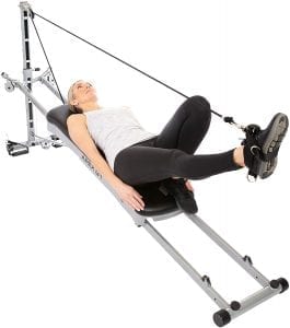 Woman using a home gym.