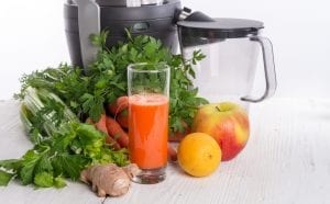 Juicer and fresh vegetables